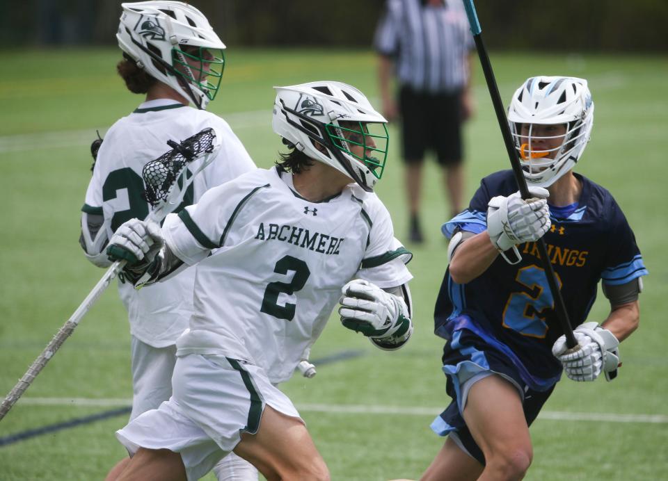 Archmere's Drew Duncan (left) works against Cape Henlopen's Mack Leonhartt in the second half of the Vikings' 13-8 win at Archmere Academy, Saturday, April 1, 2023.