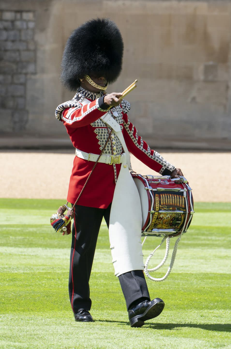 A member of the 1st Battalion Welsh Guards takes part in the celebration.