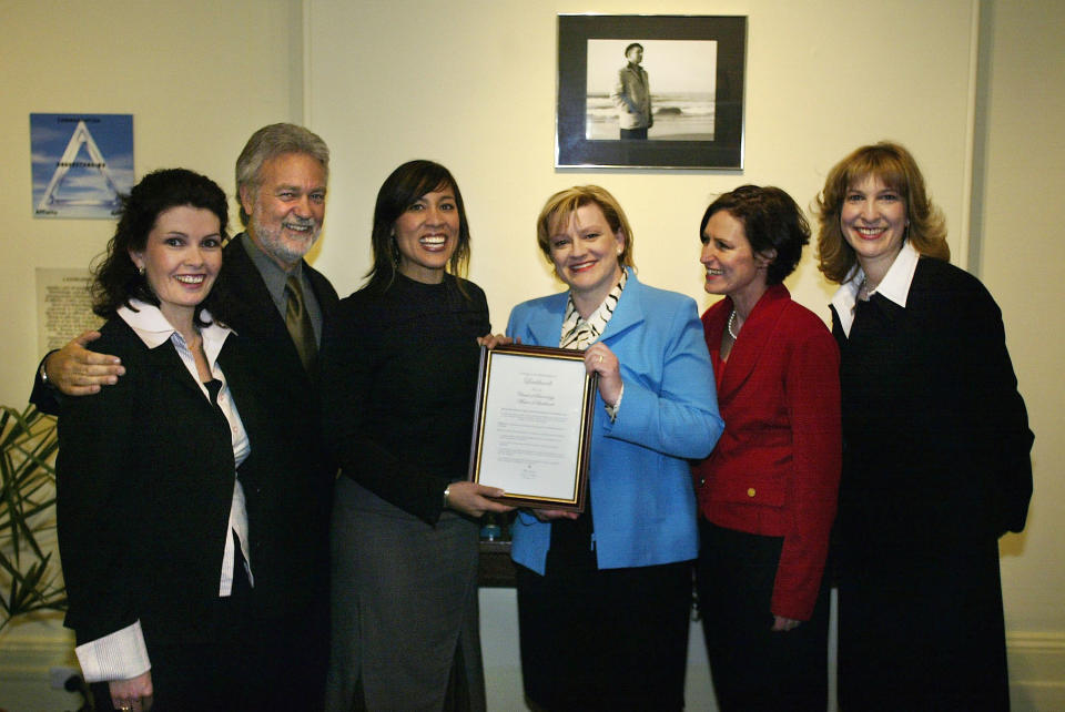 SYDNEY, AUSTRALIA - SEPTEMBER 30:  (L-R) Radio announcer Mardi Cole, President of the Church of Scientology Leichhardt, Rohn Walker, singer Kate Ceberano, Director of Community Services of Leichhardt Council, Netties Griggs, Community Relations Director Mary Szental and President of Scientology Missions International, Claire Edwards, pose at the Mission of Leichardt September 30, 2002 in Sydney, Australia. Church officials said that the mission will be further established to become Australia's first Church of Scientology "Celebrity Centre."  (Photo by Daniel Berehulak/Getty Images)