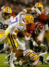 TUSCALOOSA, AL - NOVEMBER 05: Trent Richardson #3 of the Alabama Crimson Tide tries to run with the ball past Tyrann Mathieu #7 and Morris Claiborne #17 of the LSU Tigers during the game at Bryant-Denny Stadium on November 5, 2011 in Tuscaloosa, Alabama. (Photo by Streeter Lecka/Getty Images)