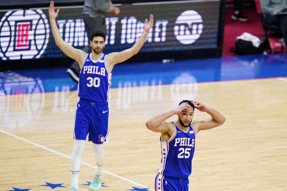 Philadelphia 76ers' Ben Simmons (25) and Furkan Korkmaz (30) react after a foul call during the first half of Game 5 in a first-round NBA basketball playoff series against the Washington Wizards, Wednesday, June 2, 2021, in Philadelphia. Ben Simmons can't shoot and lost his confidence. He blamed a mental block on the worst free-throw shooting percentage in NBA playoff history. The 76ers head into the offseason faced with a big question - do they try and salvage Simmons or deal the former No. 1 pick. (AP Photo/Matt Slocum)