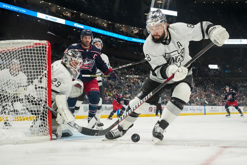 Dec 5, 2023; Columbus, Ohio, USA; Los Angeles Kings defenseman Drew Doughty (8) clears the puck away from goaltender Pheonix Copley (29) during the first period of the NHL game against the Columbus Blue Jackets at Nationwide Arena.