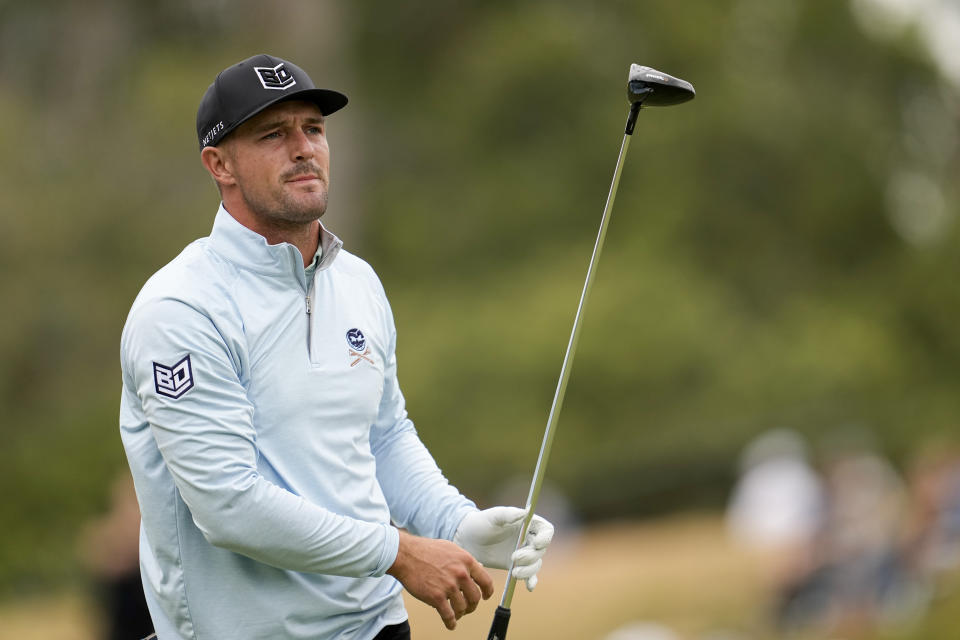 Bryson DeChambeau watches his tee shot on the third hole during the first round of the U.S. Open golf tournament at Los Angeles Country Club on Thursday, June 15, 2023, in Los Angeles. (AP Photo/George Walker IV)