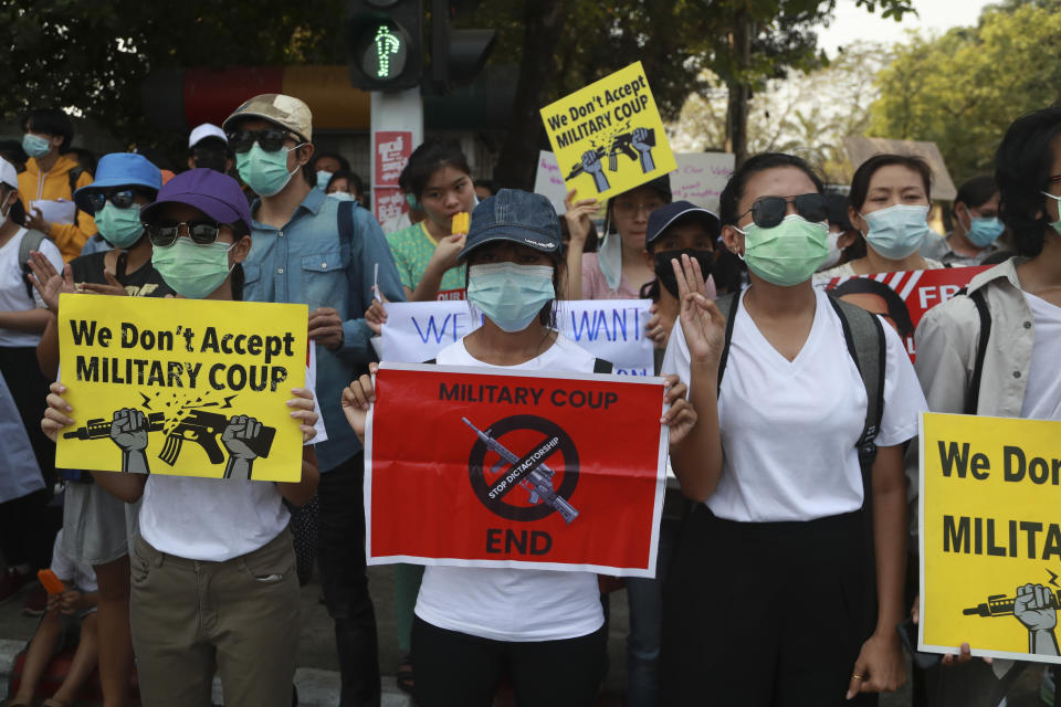 Demonstrators display placards during a protest close to Indonesian Embassy in Yangon, Myanmar, Tuesday, Feb. 23, 2021. Anti-coup protesters gathered outside the embassy following reports that Indonesia was seeking to have fellow members of the Association of Southeast Asian Nations to agree on an action plan over the Myanmar’s coup that would hold the junta to its promise to hold free and fair elections in a year’s time. (AP Photo)