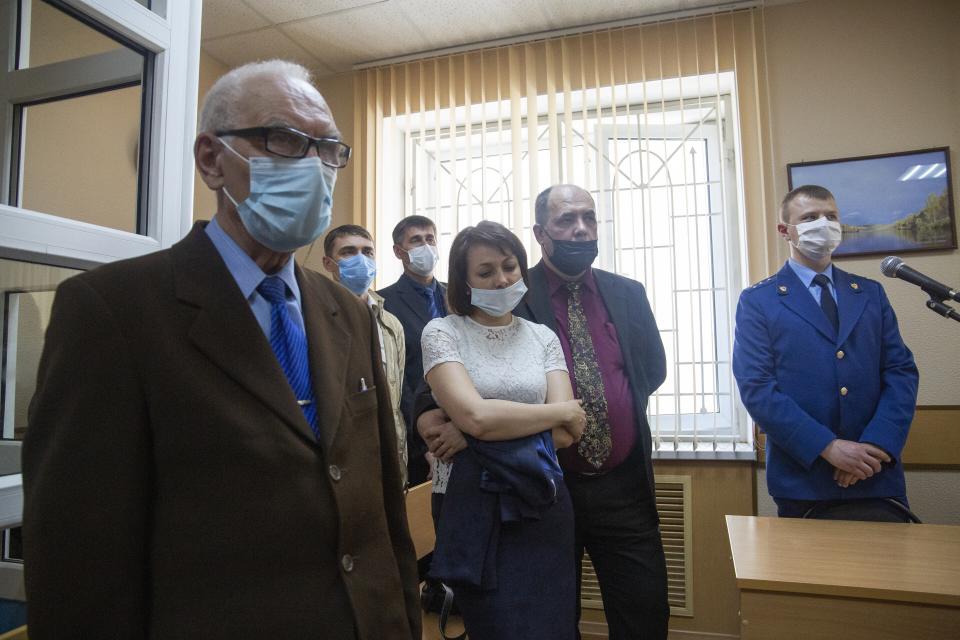 FILE - Members of Jehovah's Witnesses attend a court session in Perm, Russia, on Wednesday, May 12, 2021. Russia’s Supreme Court in 2017 declared the Jehovah's Witnesses to be an extremist organization, exposing its members to potential criminal charges. (AP Photo, File)