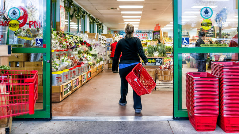 A woman walks into Trader Joe's