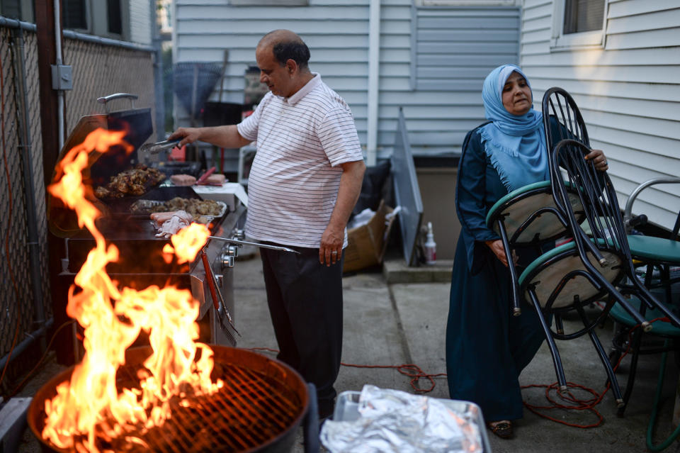 Egyptian born Muslim Americans Ahmed Sayedahmed and wife Sahar Sayedahmed grill meat and make preparations for a college graduation celebration and Iftar feast for their daughter during Ramadan in Bayonne, New Jersey, U.S. June 2, 2017. Picture taken June 2, 2017. REUTERS/Amr Alfiky