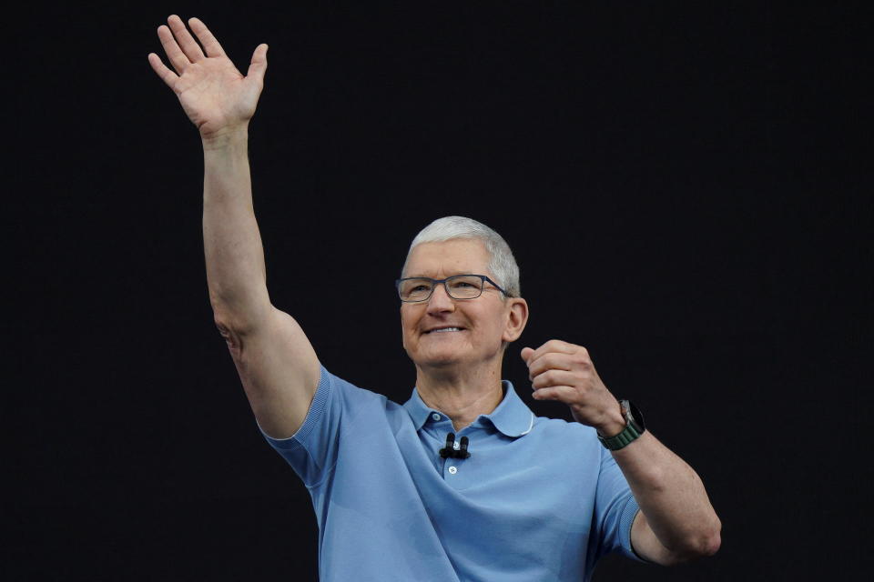 Apple CEO Tim Cook gestures at Apple's annual Worldwide Developers Conference at the company's headquarters in Cupertino, California, U.S. June 5, 2023. REUTERS/Loren Elliott