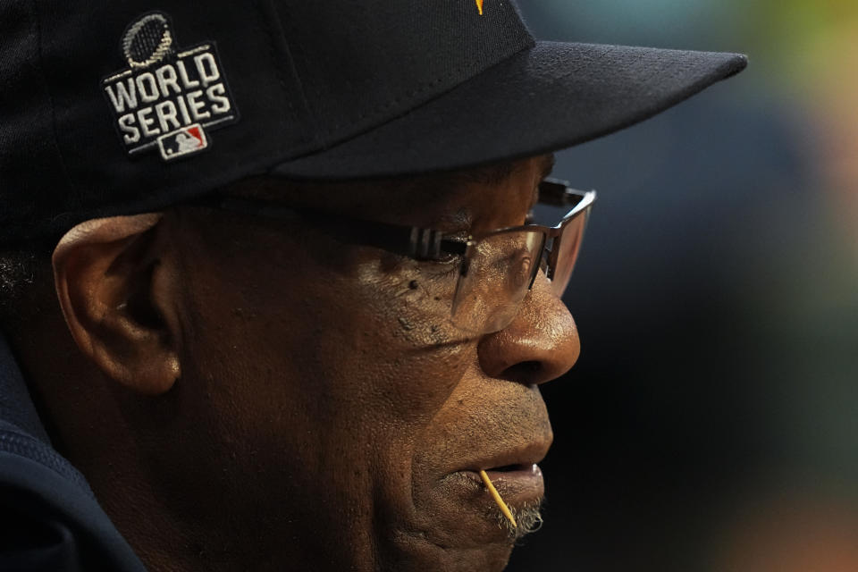 Houston Astros manager Dusty Baker Jr. watches with a toothpick in his mouth during the third inning in Game 5 of baseball's World Series between the Houston Astros and the Atlanta Braves Sunday, Oct. 31, 2021, in Atlanta. (AP Photo/David J. Phillip)
