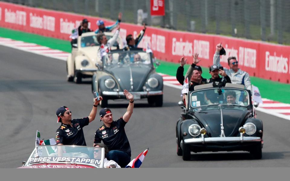 Formula One F1 - Mexico City Grand Prix - Autodromo Hermanos Rodriguez, Mexico City, Mexico - October 30, 2022 Red Bull's Sergio Perez and Max Verstappen during the drivers' parade ahead of the race - REUTERS