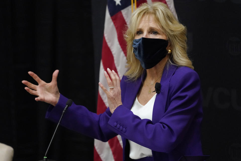 First lady Jill Biden gestures as she speaks during a visit to the Massey Cancer center at Virginia Commonwealth University for a discussion about cancer disparities. in Richmond, Va., Wednesday, Feb. 24, 2021. (AP Photo/Steve Helber)