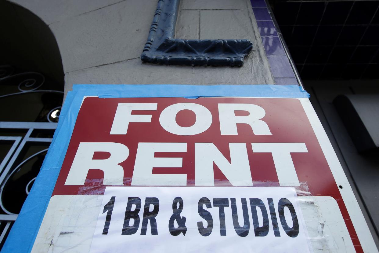 A "for rent" sign is shown outside of a property.