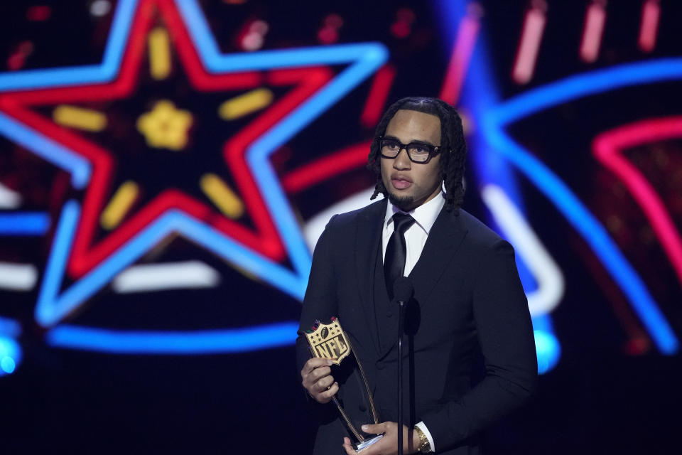 Houston Texans' C.J. Stroud, AP offensive rookie of the year speaks during the NFL Honors award show ahead of the Super Bowl 58 football game Thursday, Feb. 8, 2024, in Las Vegas. The San Francisco 49ers face the Kansas City Chiefs in Super Bowl 58 on Sunday. (AP Photo/David J. Phillip)