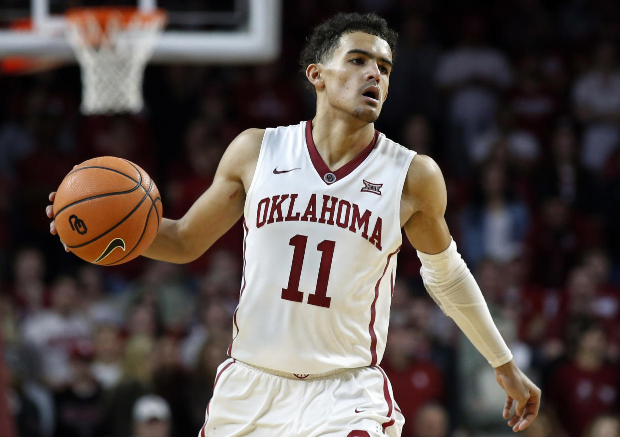 Trae Young (11) averaged 27.4 points per game as a freshman at Oklahoma. (AP Photo/Sue Ogrocki, File)