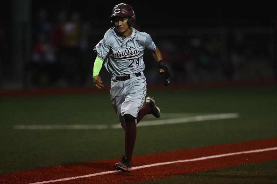 Calallen's Jaydon Cruz (24) scores a run in a game against Robstown on Thursday, May 19 at Steve Castro Field. Robstown won the first game of the best of three series on a walk off hit from Soliz.