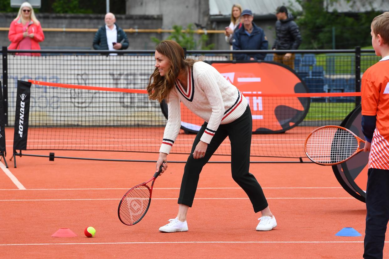 EDINBURGH, SCOTLAND - MAY 27: Catherine, Duchess of Cambridge plays tennis games with schoolchildren as they take part in the Lawn Tennis Association's (LTA) Youth programme, at Craiglockhart Tennis Centre on May 26, 2021 in Edinburgh, Scotland. (Photo by Andy Buchanan - WPA Pool/Getty Images)