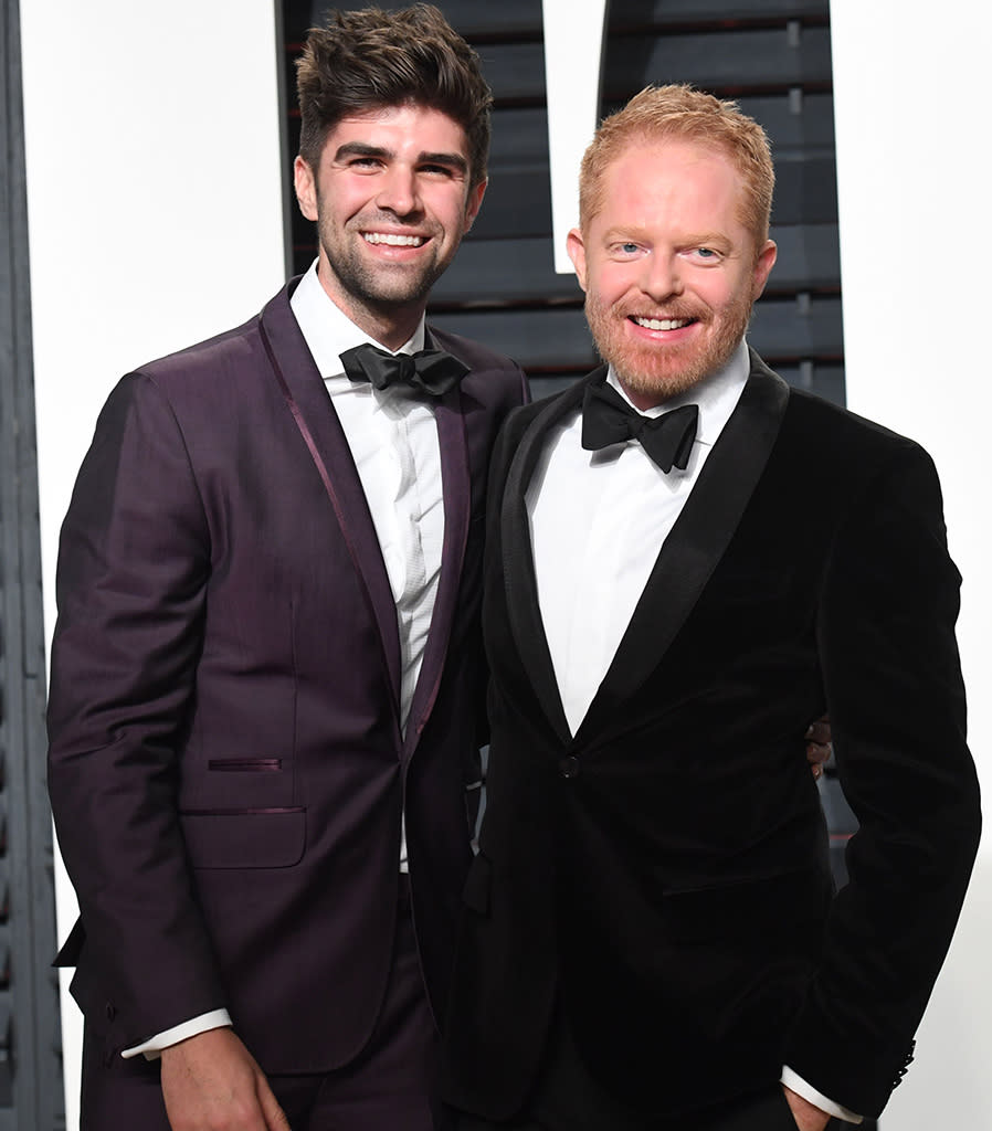 Jesse Tyler Ferguson, with husband Justin Mikita, at Vanity Fair's bash. (Photo: Tyler Boye/WWD/REX/Shutterstock)