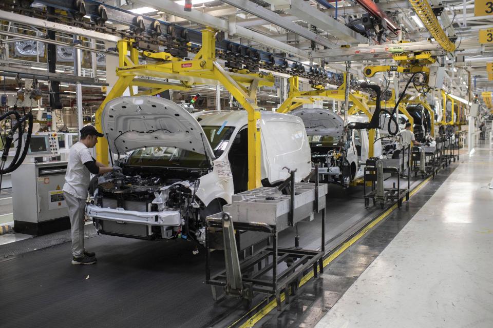 Cars are placed on a production line inside a Renault factory outside of Tangier, Morocco, Monday, April 29, 2024. Morocco has grown into a car manufacturing juggernaut over the past fifteen years, positioning itself strategically between East and West as the automotive industry transitions to electric vehicles. The country supplies more cars to Europe than China, India or Japan through new highways and an expanded port in Tangier. (AP Photo)