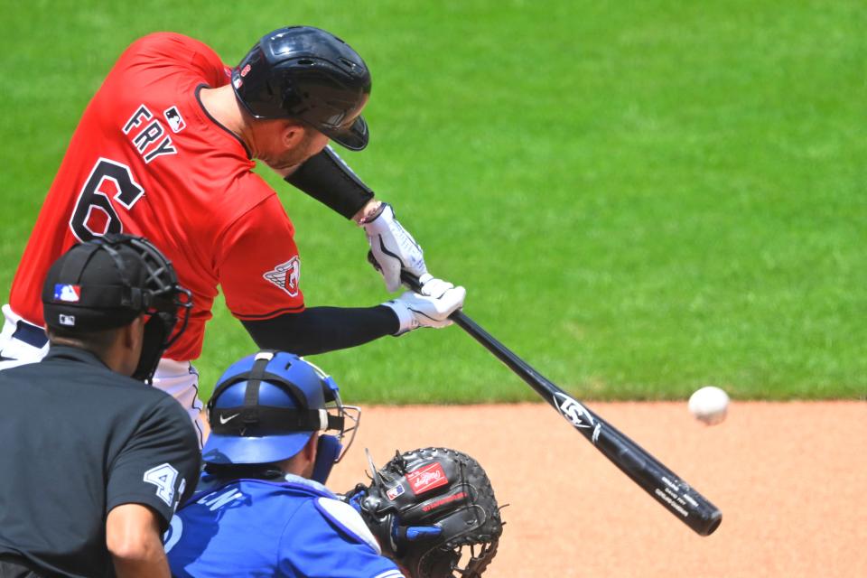 Jun 23, 2024; Cleveland, Ohio, USA; Cleveland Guardians catcher David Fry (6) hits a RBI single in the first inning against the Toronto Blue Jays at Progressive Field. Mandatory Credit: David Richard-USA TODAY Sports