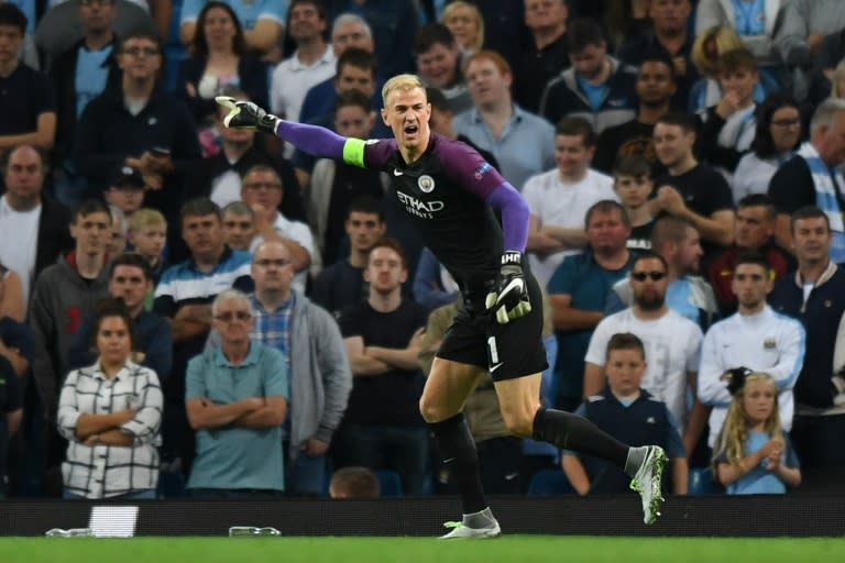 Manchester City's English goalkeeper Joe Hart gestures during the UEFA Champions league second leg play-off football match between Manchester City and Steaua Bucharest at the Etihad Stadium in Manchester, north west England on August 24, 2016