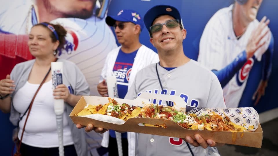 Fans also took advantage of the food at the game. - Zac Goodwin/PA Images/Getty Images