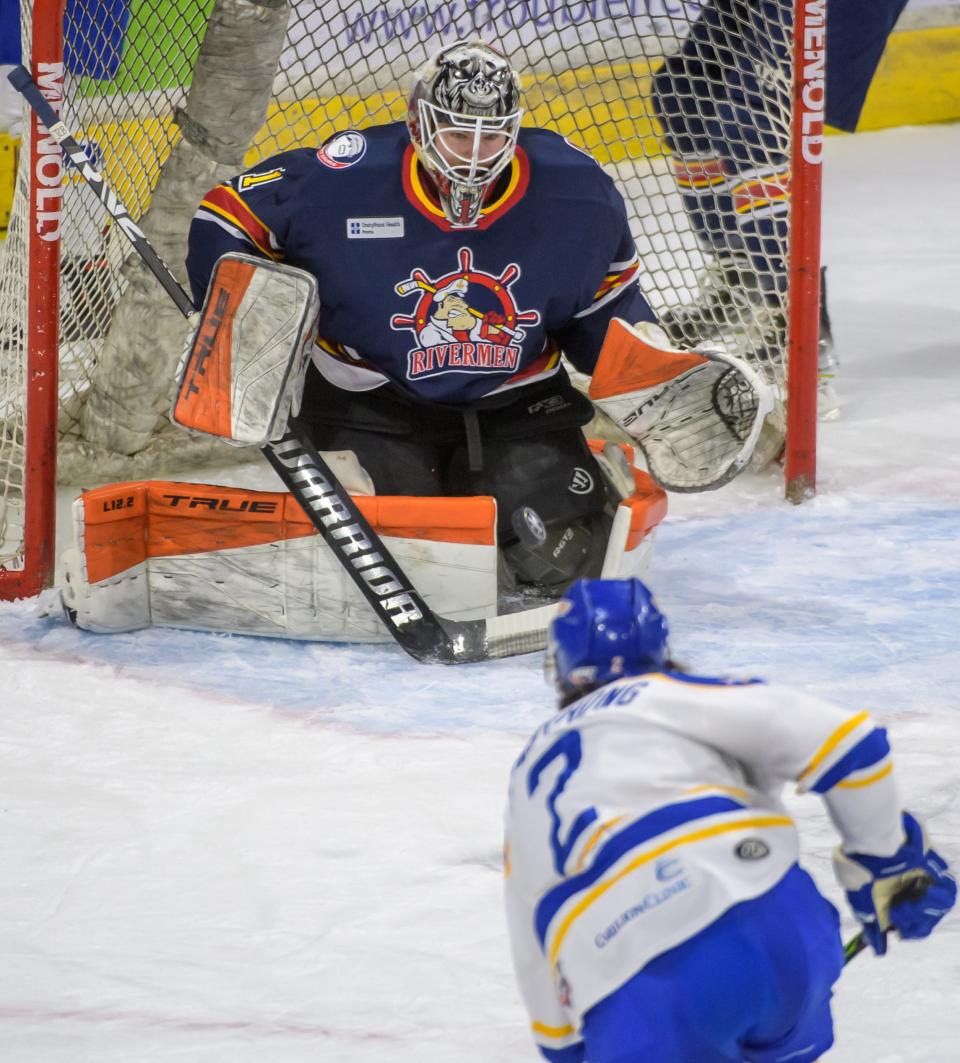 Peoria goaltender Jack Berry keeps his eyes on the approaching puck on a goal attempt by Roanoke's Travis Armstrong in the first period of Game One of the SPHL finals Thursday, April 28, 2022 at Carver Arena in Peoria.