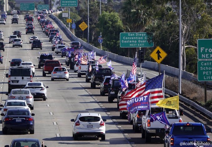 A caravan in support of President Donald Trump rolls into San Diego