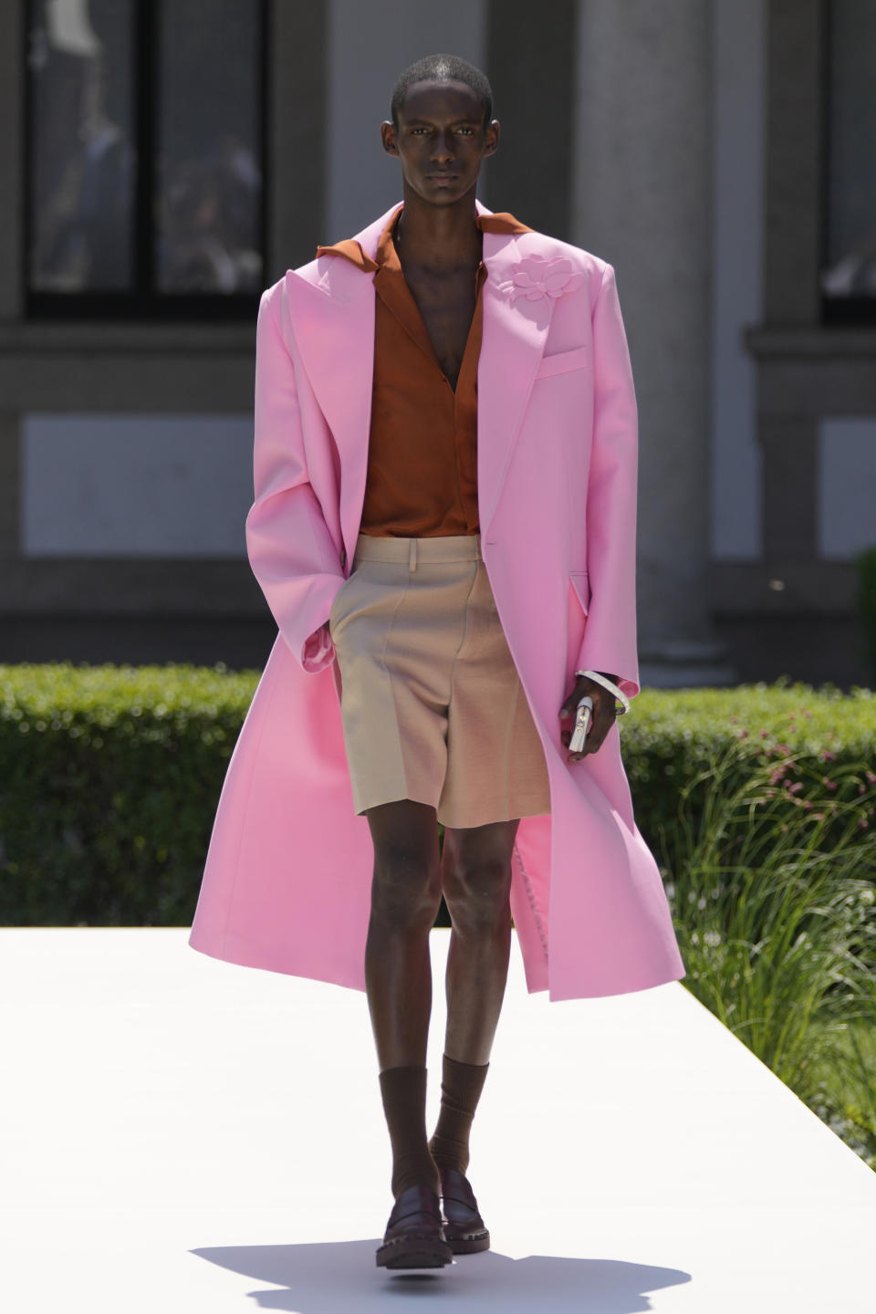 A model wears a creation as part of the Valentino men's Spring Summer 2024 collection presented in Milan, Italy, Friday, June 16, 2023. (AP Photo/Luca Bruno)