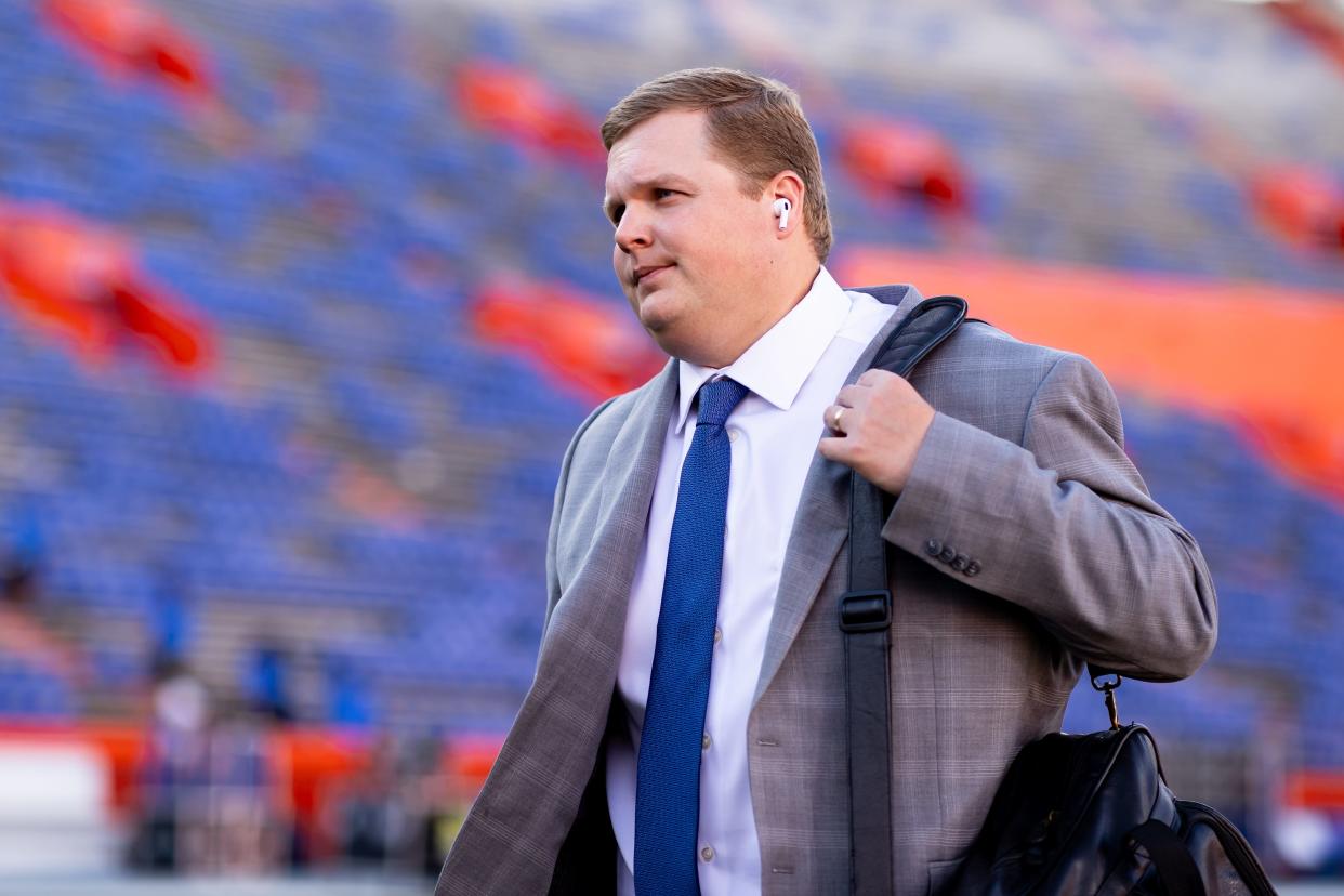 Sep 9, 2023; Gainesville, Florida, USA; Florida Gators defensive coordinator Austin Armstrong walks on the field during Gator Walk before the game against the McNeese State Cowboys at Ben Hill Griffin Stadium. Mandatory Credit: Matt Pendleton-USA TODAY Sports