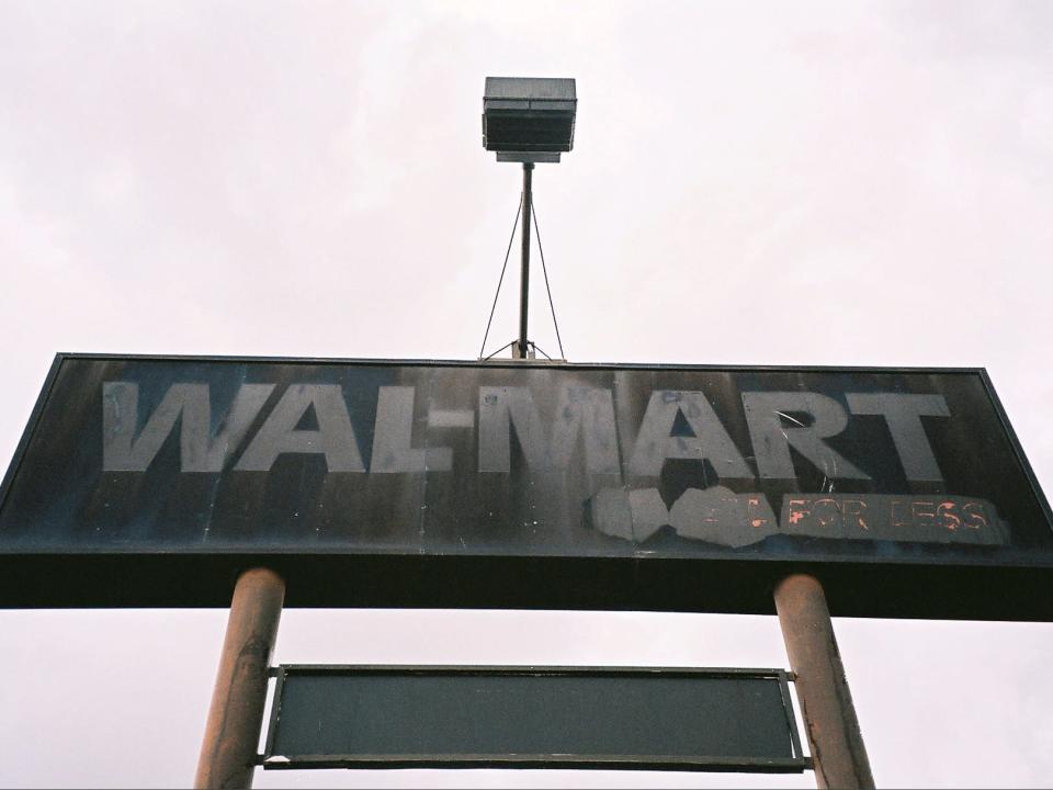 wal mart sign blacked out destroyed broken