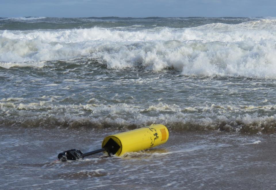 Mysterious object in the surf, somewhere north of Long Nook Beach in Truro.