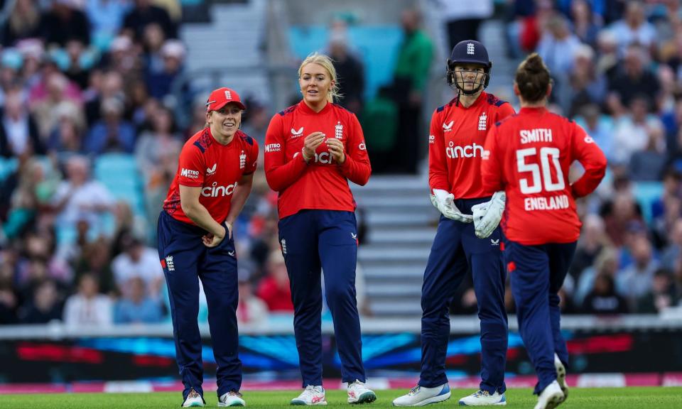 <span>Sarah Glenn (centre) celebrates with teammates after bowling out <a class="link " href="https://sports.yahoo.com/soccer/teams/new-zealand-women/" data-i13n="sec:content-canvas;subsec:anchor_text;elm:context_link" data-ylk="slk:New Zealand;sec:content-canvas;subsec:anchor_text;elm:context_link;itc:0">New Zealand</a>’s Jess Kerr at the Oval.</span><span>Photograph: Steven Paston/PA</span>