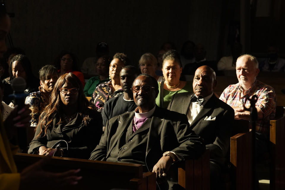 Palm Springs Section 14 survivors and descendants listen to Areva Martin, civil rights attorney, at the United Methodist Church in Palm Springs, Calif., Sunday, April 16, 2023. Black and Latino Californians who were displaced from their Section 14 neighborhood in Palm Springs allege the city pushed them out by hiring contractors to destroy homes in an area that was tight-knit and full of diversity. (AP Photo/Damian Dovarganes)