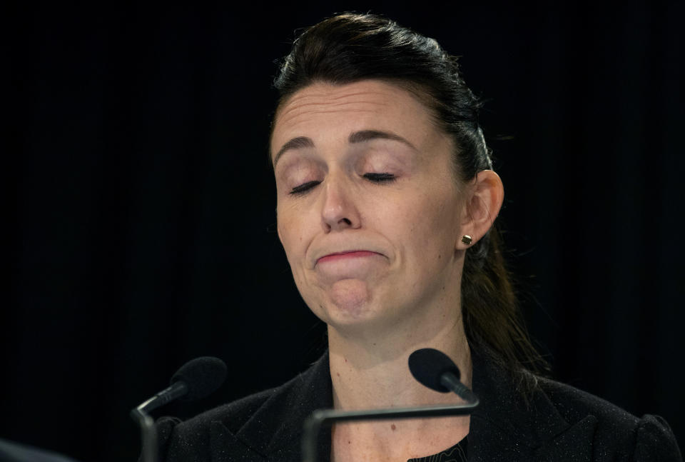 New Zealand Prime Minister Jacinda Ardern reacts at a press conference when she spoke about murdered British tourist Grace Millane during her weekly post-Cabinet press conference in Wellington, New Zealand, Monday, Dec. 10, 2018. Ardern made an emotional apology to the family of a 22-year-old British tourist who police say was murdered. Ardern spoke about the nation's reaction to the case several hours after the man that police accuse of killing Grace Millane made his first appearance in court. (Mark Mitchell/New Zealand Heralds via AP)