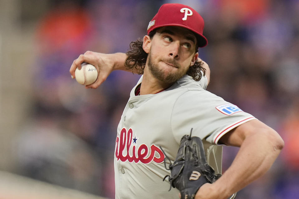 Philadelphia Phillies pitcher Aaron Nola delivers against the New York Mets during the fourth inning of Game 3 of the National League baseball playoff series, Tuesday, Oct. 8, 2024, in New York. (AP Photo/Seth Wenig)