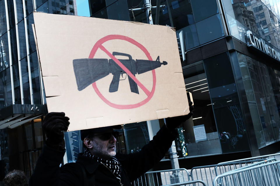 Banning assault-style weapons, which this protester may well support,&nbsp;is not&nbsp;one of the areas in which gun owners and non-gun owners agree. (Photo: Spencer Platt via Getty Images)