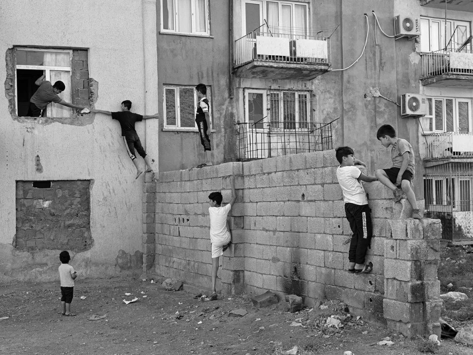 Syrian children play in Istasyon neighbourhood of Mardin in October 2020. Turkey is home to more than 3.6 million Syrian refugees, who constitute the vast majority of the over 4 million refugees and asylum seekers that make the country the world’s largest host of refugees (Emin Ozmen/Magnum Photos)