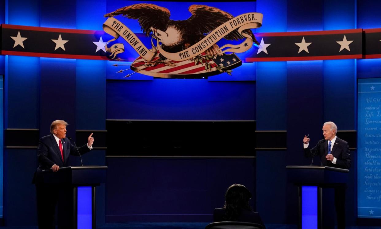 <span>Donald Trump, left, and Joe Biden speak during the debate at Belmont University in Nashville, Tennessee, on 22 October 2020.</span><span>Photograph: Patrick Semansky/AP</span>