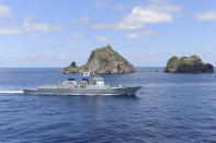 In this photo provided by South Korea's Navy, South Korean Navy's Aegis destroyer, King Sejong the Great, sails during the drill near the islets called Dokdo in Korean and Takeshima in Japanese, Sunday, Aug. 25, 2019. In a development that could possibly further complicate ties between Seoul and Tokyo, South Korea's navy on Sunday began two-day exercises on and around a group of islets controlled by South Korea but also claimed by Japan. (South Korea's Navy via AP)