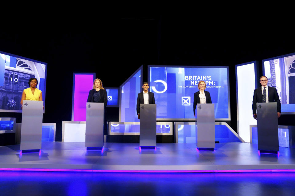 From left, Kemi Badenoch, Penny Mordaunt, Rishi Sunak, Liz Truss and Tom Tugendhat before the live television debate for the candidates for leadership of the Conservative party, hosted by Channel 4 in London, Friday, July 15, 2022. (Victoria Jones/PA via AP)