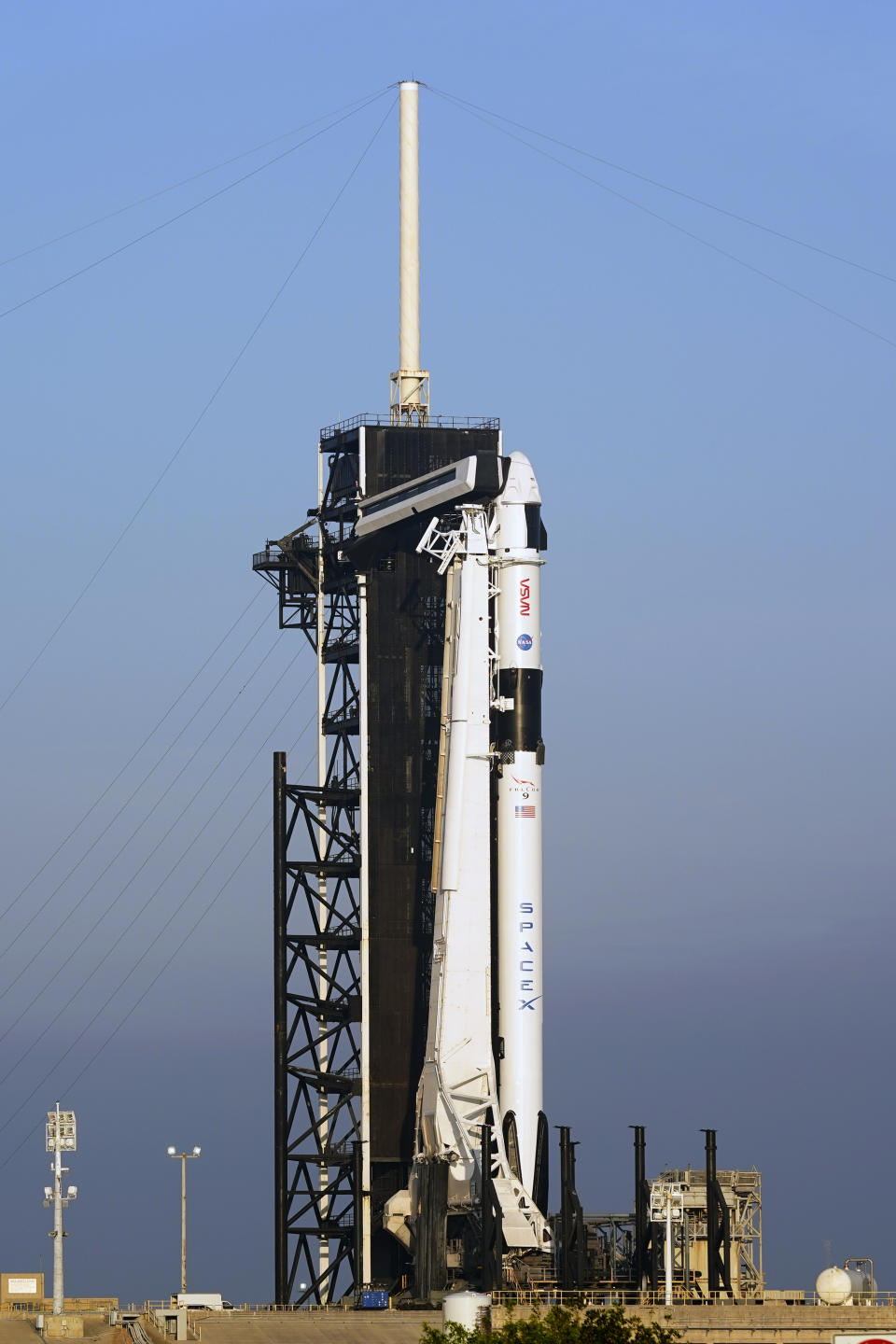 A SpaceX Falcon 9 rocket with the crew capsule Endeavour stands ready on pad 39A at the Kennedy Space Center in Cape Canaveral, Fla., Wednesday, March 1, 2023. The launch is scheduled for early Thursday morning. (AP Photo/John Raoux)