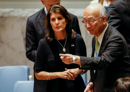 U.S. Ambassador to the United Nations Nikki Haley speaks with Japan's U.N. Ambassador Koro Bessho during a United Nations Security Council meeting about implementation of sanctions against North Korea at U.N. headquarters in New York City, U.S., September 17, 2018. REUTERS/Brendan McDermid