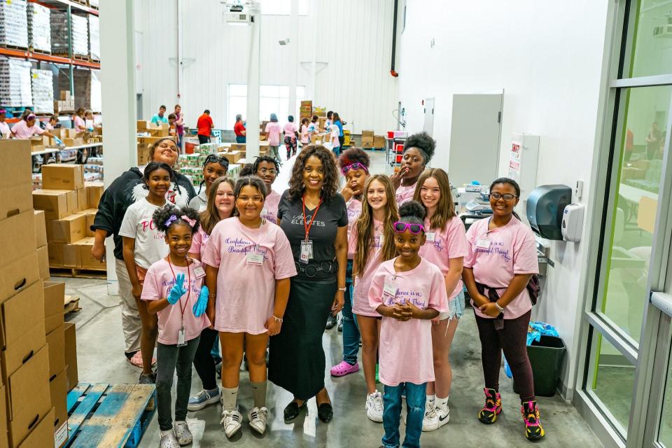 DeLores Pressley and She Elevates Academy participants on a field trip to the Akron-Canton Regional Foodbank.