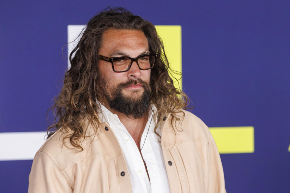 FILE - Jason Momoa appears at the premiere of "Ambulance" in Los Angeles on April 4, 2022 Momoa will host Discovery's “Shark Week,”. premiering on Sunday. (Photo by Willy Sanjuan/Invision/AP, File)