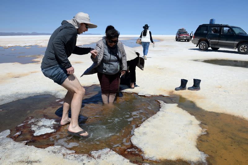 Uyuni Salt Flat attracts photo-seeking tourists, in Bolivia