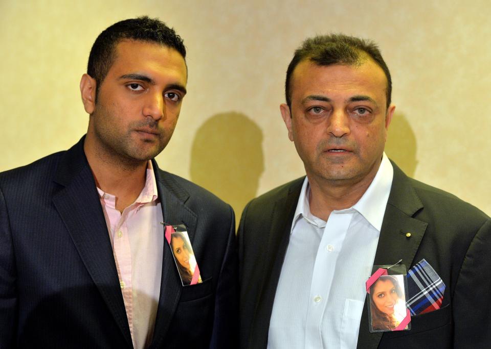 Asok Hindocha, right, the uncle of Anni Dewani and Anish Hindocha, the brother of Anni Dewani speak at a press conference in central London, Monday, April 7, 2014. Anni Dewani was found shot dead in an abandoned taxi in Cape Town's Gugulethu township in November 2010. Her husband Shrien Dewani has spent years fighting extradition over the death of his 28-year-old bride, lawyers for the 34-year-old businessman say he suffers from post-traumatic stress and depression and is unfit to stand trial. But last month Britain’s High Court rejected his grounds for appeal. He is expected to be put on a flight to Cape Town Monday, and South African officials say he will appear in court there Tuesday. The Anni Dewani’s brother, Anish Hindocha, said the extradition brought them “one step closer” to justice. (AP Photo/John Stillwell, PA Wire) UNITED KINGDOM OUT - NO SALES - NO ARCHIVES