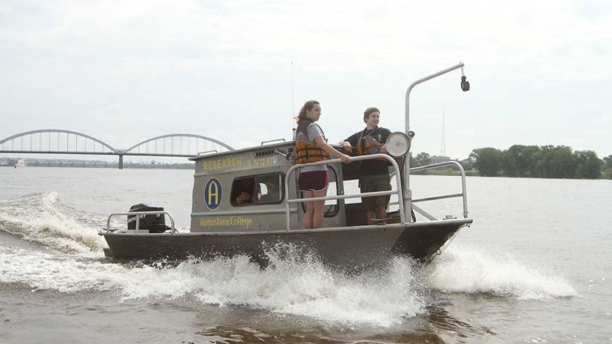 Alumni returning for the 75th anniversary of the Geography Department will tour key sites in the Quad Cities and experience the Mississippi River aboard the geography department’s research boat The Scholarship. (Augustana College)