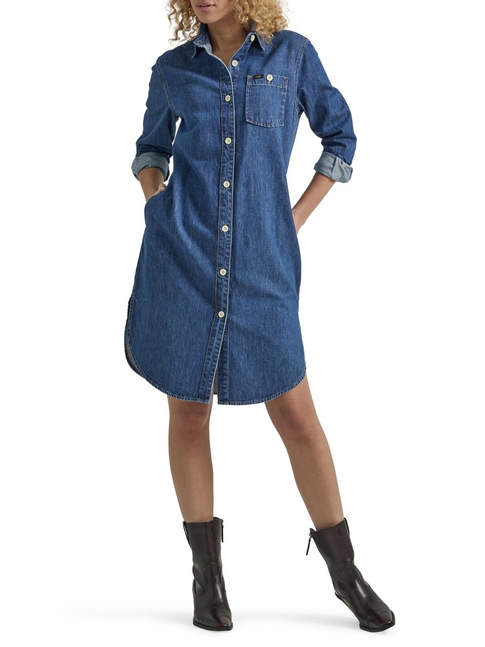 a model wearing the blue denim dress