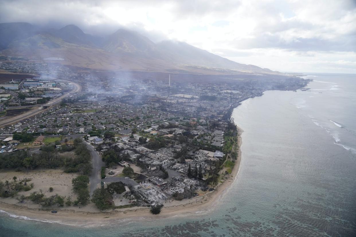 A view of the devastation in Lahaina, Hawaii, following the wildfires in August 2023. <a href="https://newsroom.ap.org/detail/HawaiiFires/d2b512c087ea4705ba5dfaff7fb99bc5/photo?Query=fires%20Lahaina&mediaType=photo&sortBy=&dateRange=Anytime&totalCount=694&currentItemNo=3&vs=true" rel="nofollow noopener" target="_blank" data-ylk="slk:AP Photo/Rick Bowmer;elm:context_link;itc:0;sec:content-canvas" class="link ">AP Photo/Rick Bowmer</a>