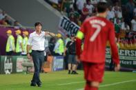 German headcoach Joachim Loew gestures during the Euro 2012 championships football match Germany vs Portugal on June 9, 2012 at the Arena Lviv. AFP PHOTO / DAMIEN MEYERDAMIEN MEYER/AFP/GettyImages